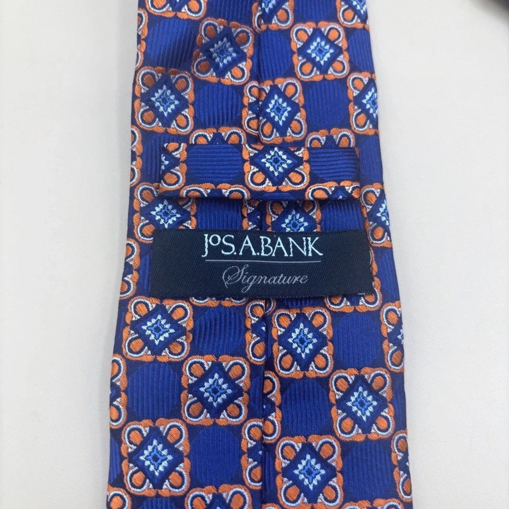 Jos A Bank Signature Mens Silk Tie Blue Orange Geometric Medallion Silk Necktie